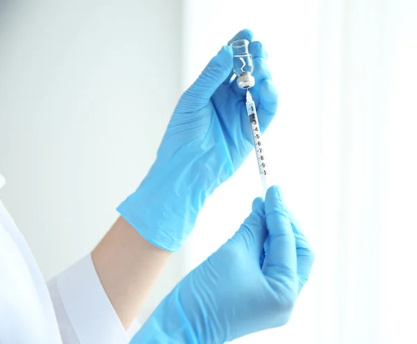 Doctor hands with syringe — Stock Photo, Image