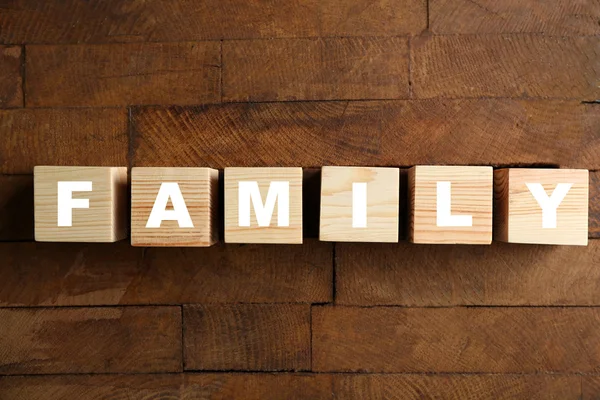 Slovo rodina na stole — Stock fotografie