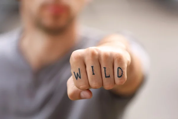 Fist with fake tattoo — Stock Photo, Image