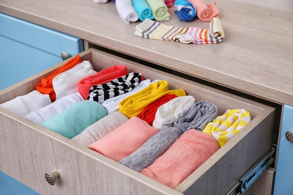 Neatly folded clothes — Stock Photo, Image