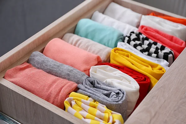 Neatly folded clothes — Stock Photo, Image