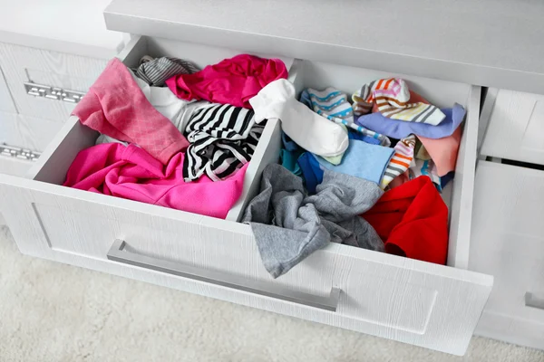 Chaos in chest of drawer — Stock Photo, Image