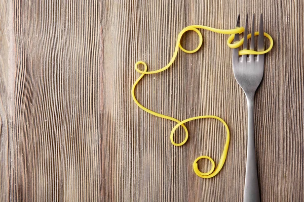 Virvlar av pasta och gaffel — Stockfoto