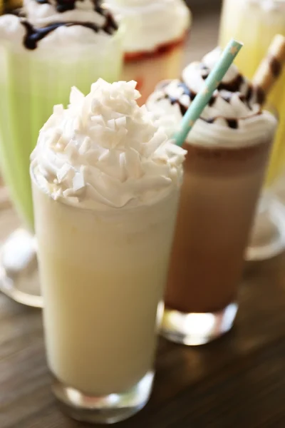 Delicious milkshakes in glasses — Stock Photo, Image