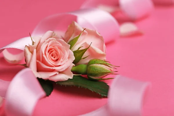 Fresh roses with ribbon — Stock Photo, Image