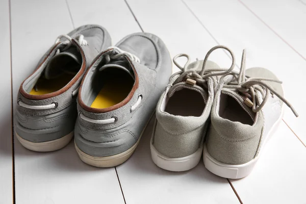 Velké a malé boty — Stock fotografie