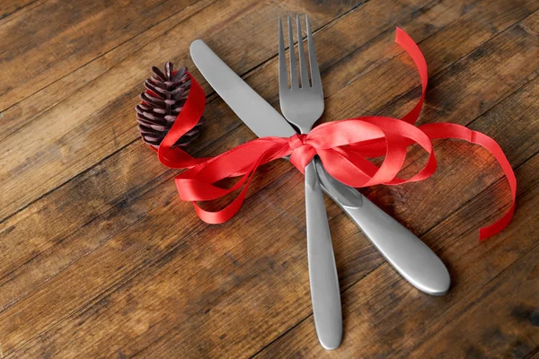 Fork and knife with ribbon — Stock Photo, Image