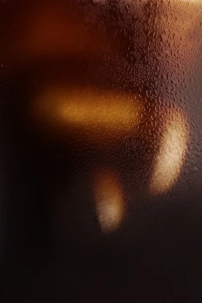 Ice cubes in coffee — Stock Photo, Image