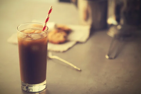 Iced coffee with straw — Stock Photo, Image