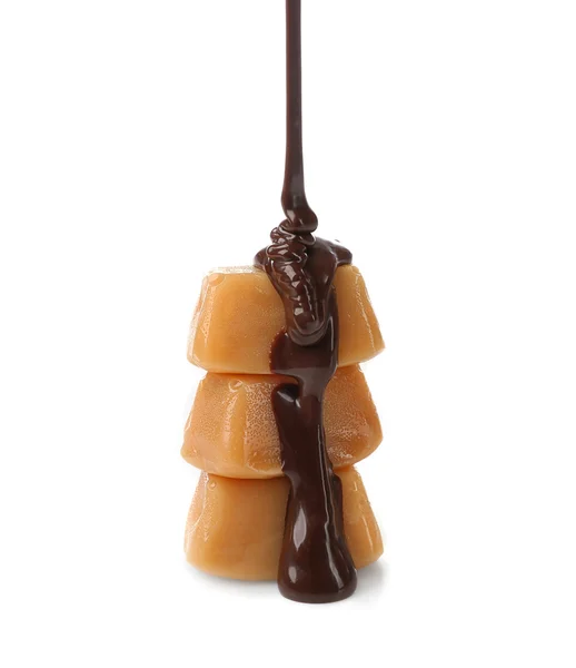 Melted chocolate with caramel candies — Stock Photo, Image