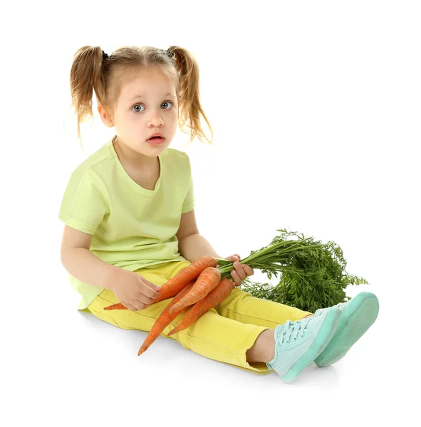 Beautiful girl with carrots — Stock Photo, Image