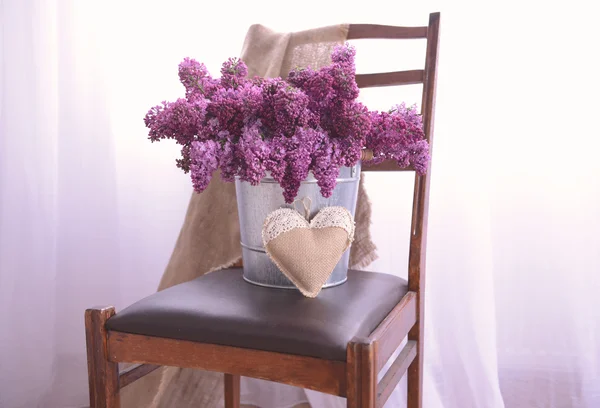 Lilac bouquet in metal bucket — Stock Photo, Image