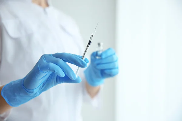 Doctor hands with syringe — Stock Photo, Image