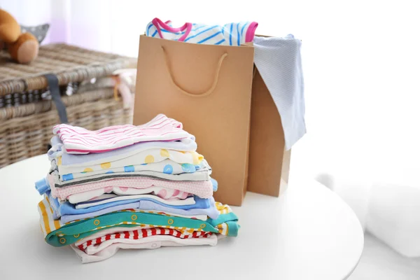 Pile of baby clothes — Stock Photo, Image