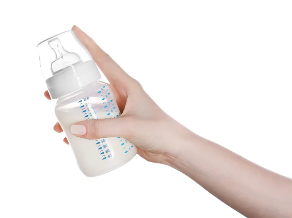 Bir bebek şişe tutan el — Stok fotoğraf
