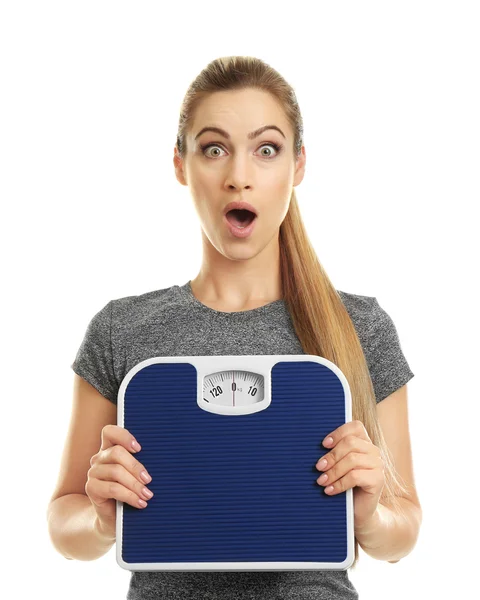 Beautiful woman holding floor scales — Stock Photo, Image