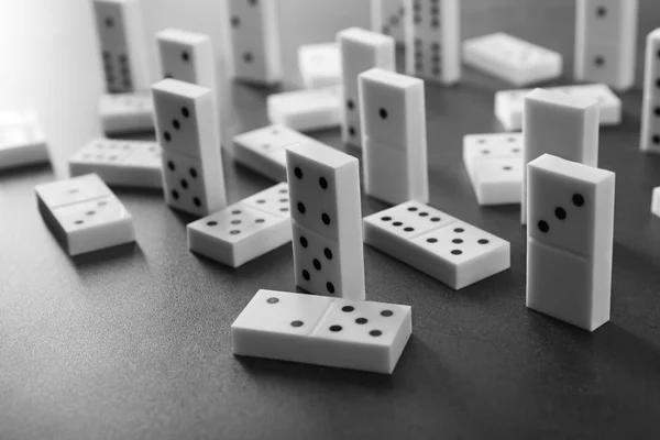 Heap of dominoes on grey — Stock Photo, Image