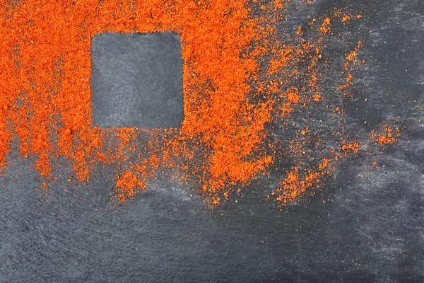 Paprikové prášek s čtvercová silueta — Stock fotografie