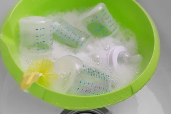 Sterilizing baby bottles — Stock Photo, Image