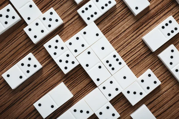 Heap of dominoes on table — Stock Photo, Image