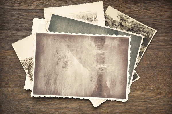 Vintage photos on table — Stock Photo, Image