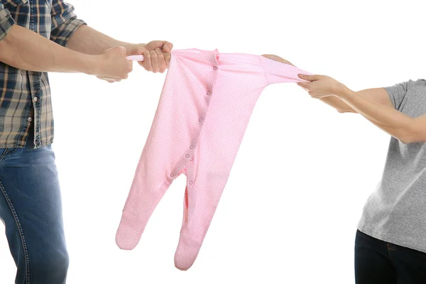Parents dividing children clothes — Stock Photo, Image