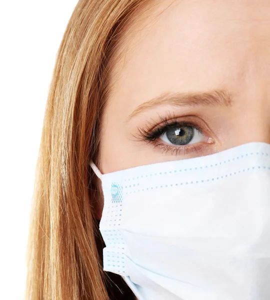 Meisje met een medisch masker — Stockfoto