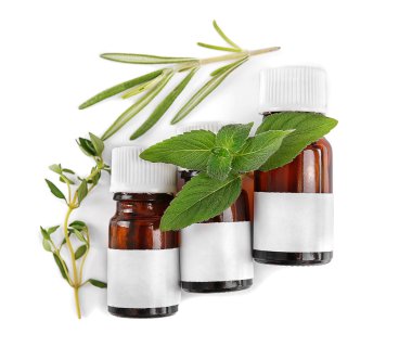 Damlalıklı şişeler ve otlar