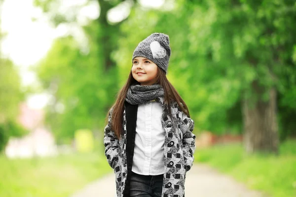 Little girl wearing stylish clothes outdoors. — Stock Photo, Image