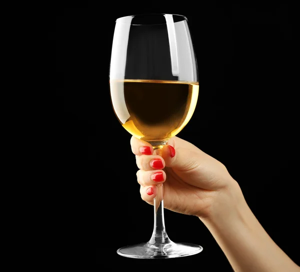 Hand som håller glas vin — Stockfoto