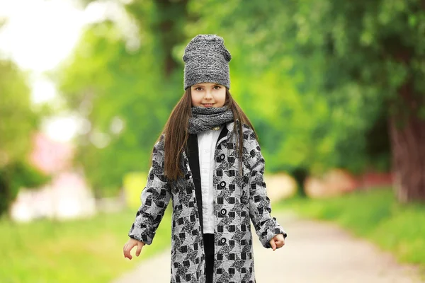 Little girl wearing stylish clothes outdoors. — Stock Photo, Image