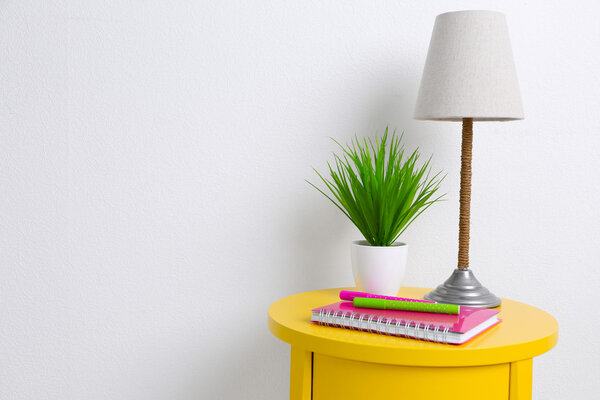 lamp and plant on table