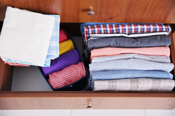 Neatly folded clothes — Stock Photo, Image