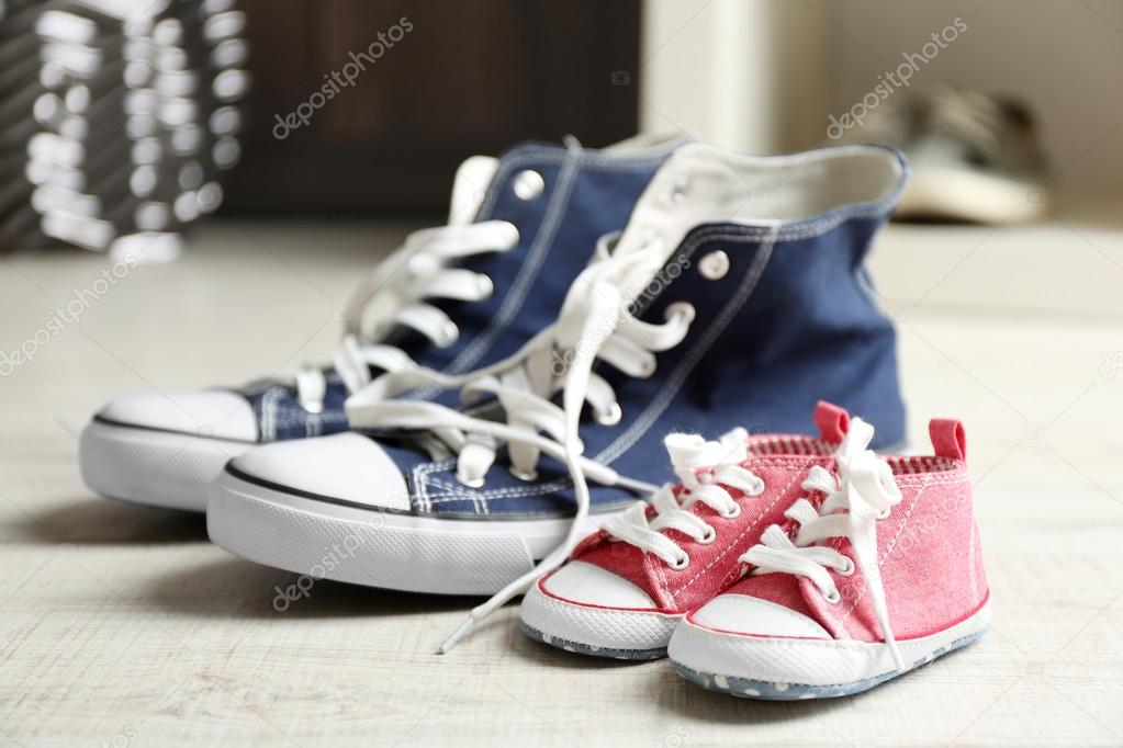 Big and small shoes Stock Photo by 
