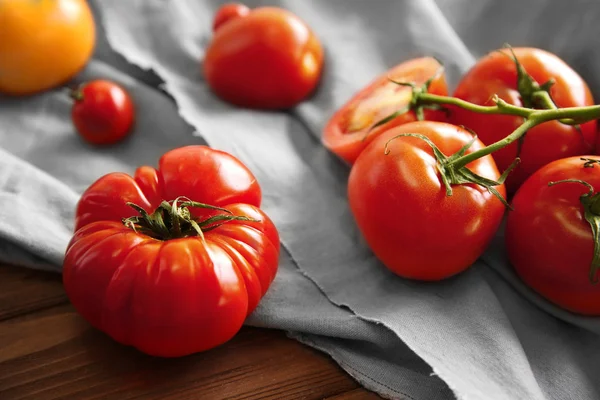 Rustic composition of tomatoes — Stock Photo, Image