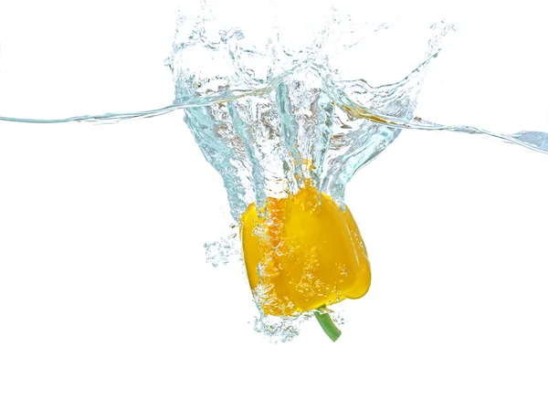 Pepper falling in water — Stock Photo, Image