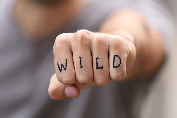 Fist with fake tattoo — Stock Photo, Image