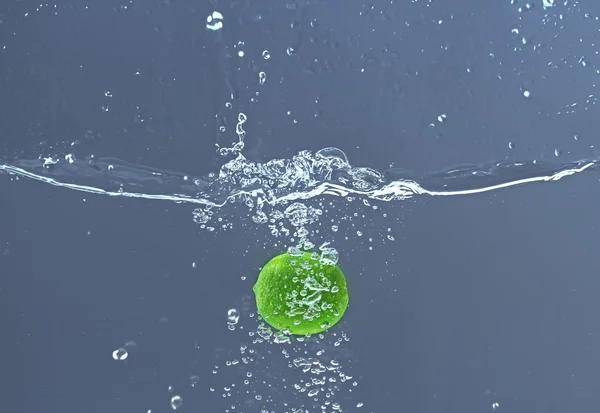 lime falling in water