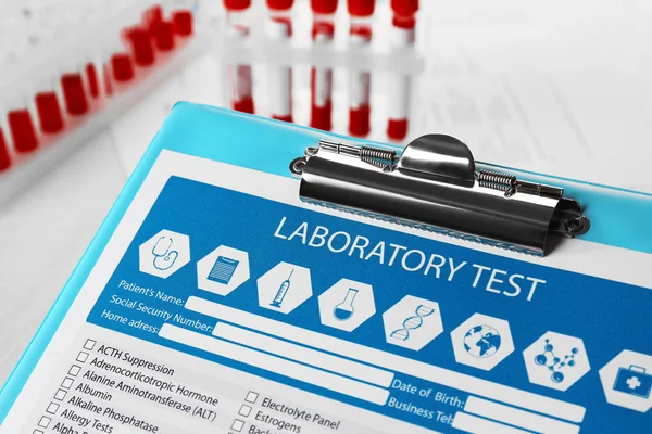 Laboratory test on clipboard — Stock Photo, Image