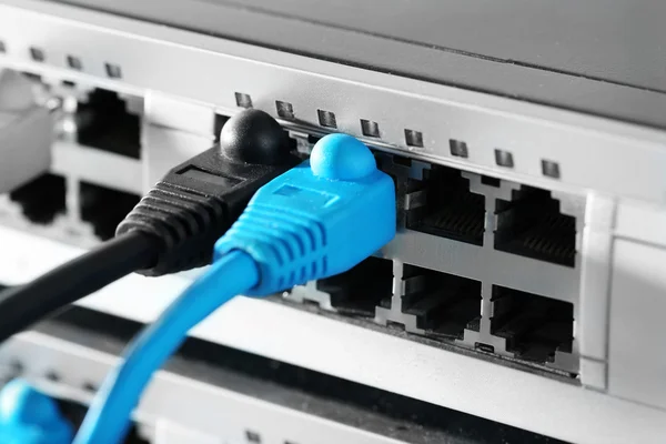 Ethernet cables connected to network switch — Stock Photo, Image