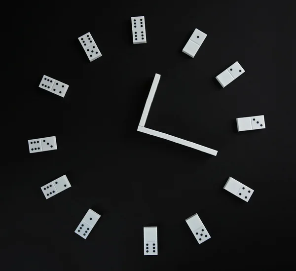 Dominoes in shape of clock — Stock Photo, Image