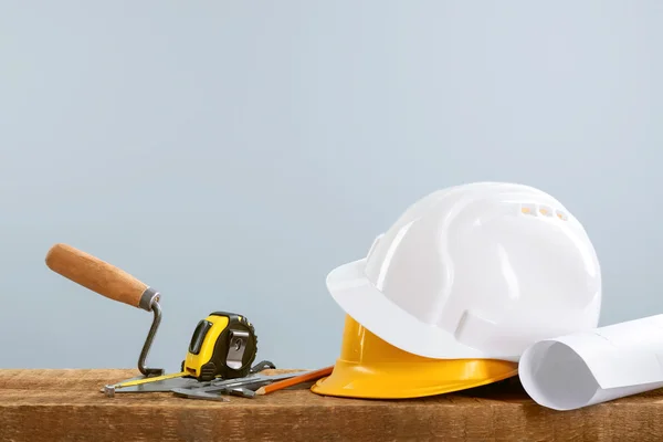 Construction blueprints with tools — Stock Photo, Image