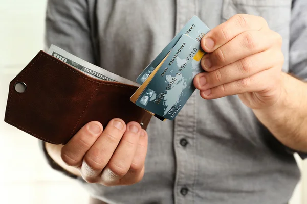 Man holding wallet — Stock Photo, Image