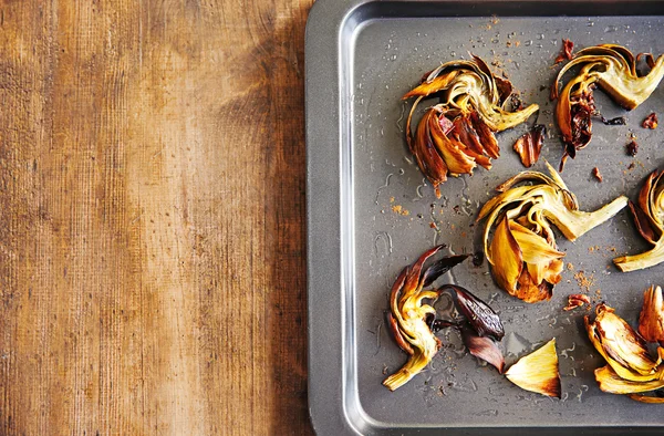 Baked artichokes with spices — Stock Photo, Image