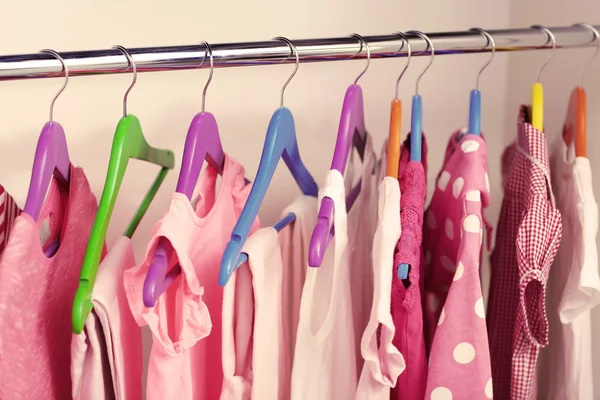 Children clothes hanging — Stock Photo, Image