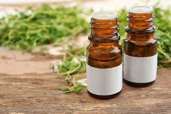 Dropper bottles and herbs — Stock Photo, Image