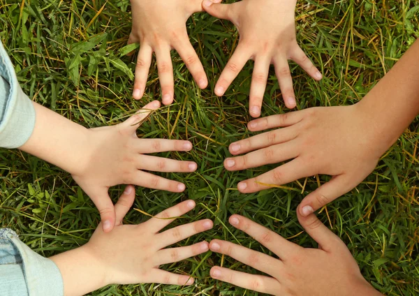 Holding hands together — Stock Photo, Image