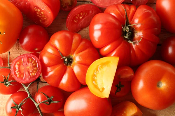 Different juicy tomatoes — Stock Photo, Image