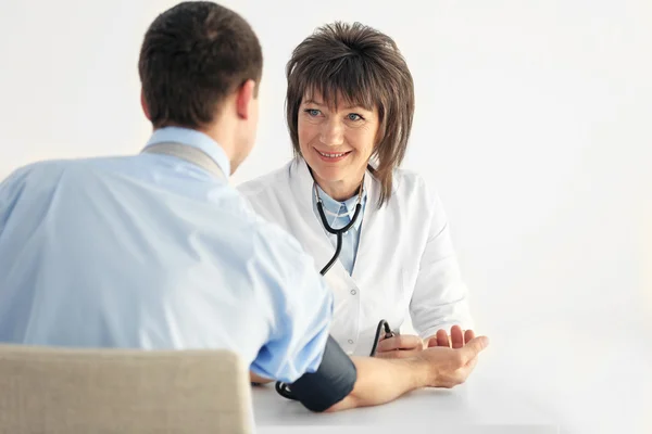 Female Doctor Measuring Man Blood Pressure Tonometer — Stock Photo, Image