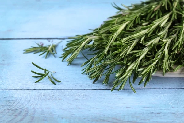 Fresh rosemary on table — Stock Photo, Image